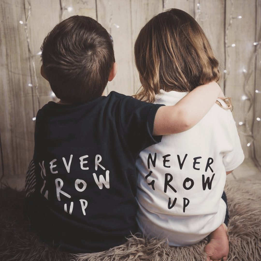 Never Grow Up Unisex Short Sleeve Baby & Kids T-Shirt